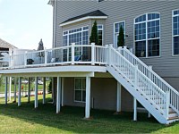 <b>White Washington vinyl railing with glass pickets and vinyl gazebo white beam and support post wraps</b>